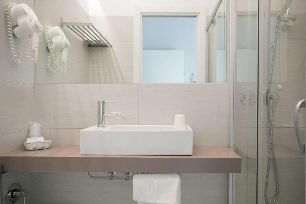 Koupelna v ubytování Hotel Benvenuto