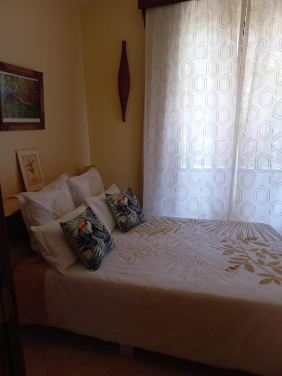 Кровать или кровати в номере La Villa Marie Joana