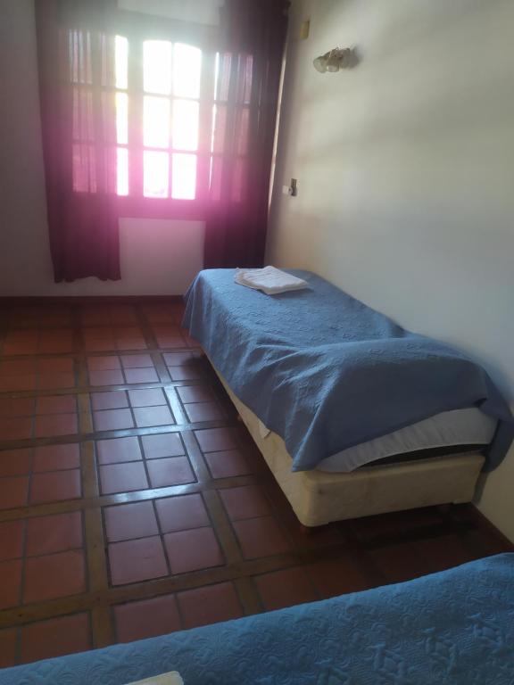 Postel nebo postele na pokoji v ubytování Tanino Guest House