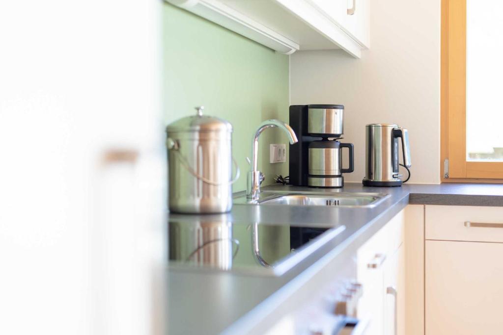 Kuchyň nebo kuchyňský kout v ubytování Appartements Veronika