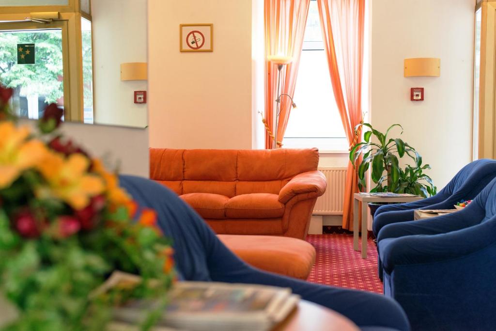 Posezení v ubytování Garten- und Kunsthotel Gabriel City