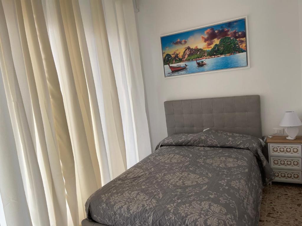 Кровать или кровати в номере Joys House