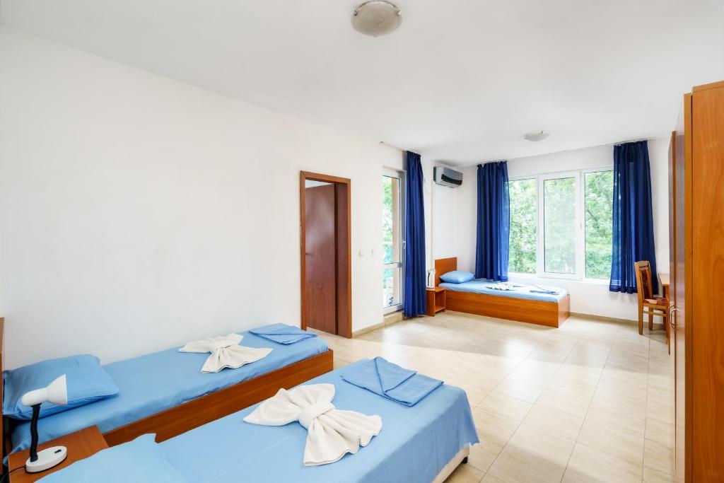 Postel nebo postele na pokoji v ubytování Hotel Park 2