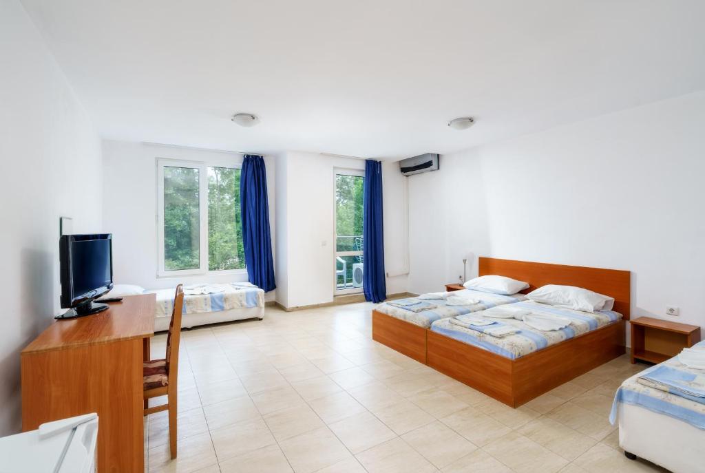 Postel nebo postele na pokoji v ubytování Hotel Park 2