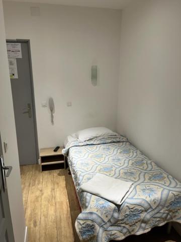 Un ou plusieurs lits dans un hébergement de l'établissement Hotel Luna Park
