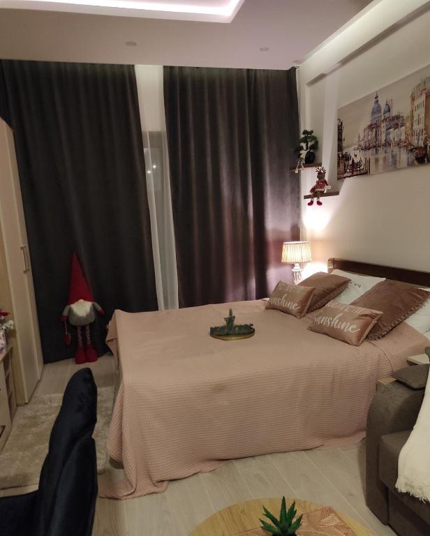 Ένα ή περισσότερα κρεβάτια σε δωμάτιο στο Apartman MOUNTAIN VIEW Milmari Resort