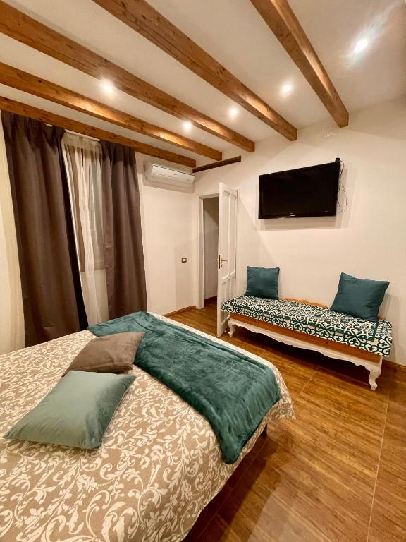 Łóżko lub łóżka w pokoju w obiekcie Interno12