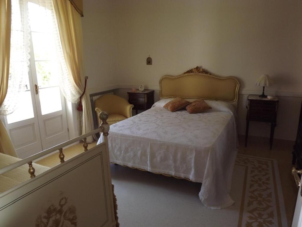 Postel nebo postele na pokoji v ubytování B&b La Balaustra