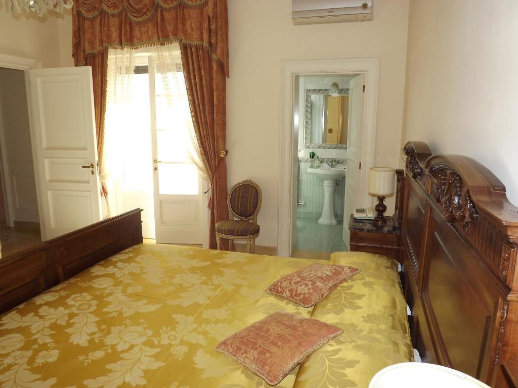 Postel nebo postele na pokoji v ubytování B&b La Balaustra