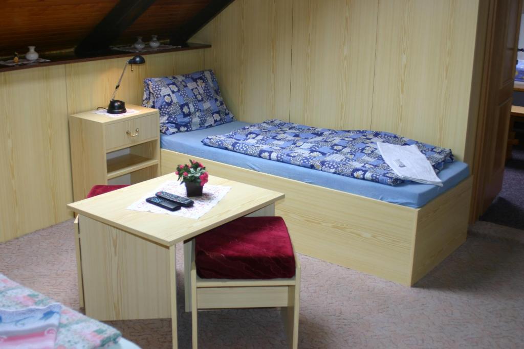 Łóżko lub łóżka w pokoju w obiekcie Pension U Vlášků