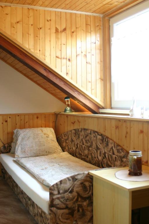 Łóżko lub łóżka w pokoju w obiekcie Pension U Vlášků