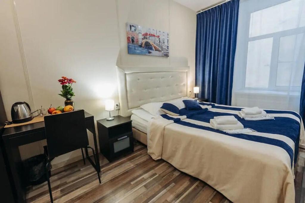 Cama o camas de una habitación en Три Мушкетера Отель