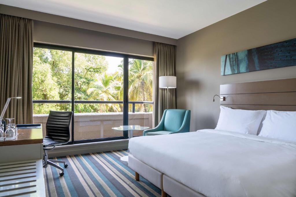 Radisson Blu Mammy Yoko Hotel - Suite Met Balkon- En Lounge -toegang