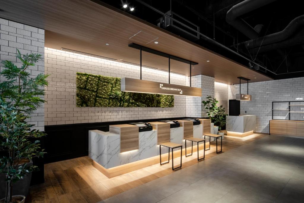 Kuchyň nebo kuchyňský kout v ubytování Tokyu Stay Shinjuku Eastside