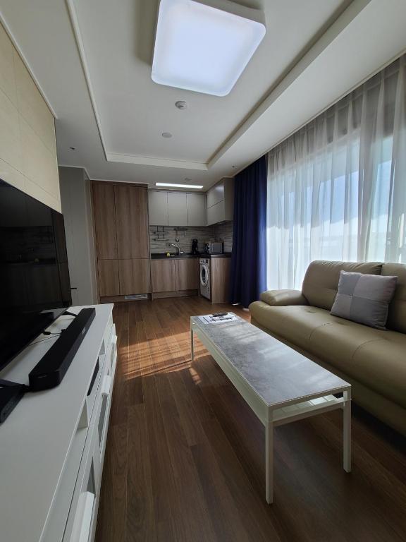 Kuchyň nebo kuchyňský kout v ubytování Risen Ocean Park Hotel
