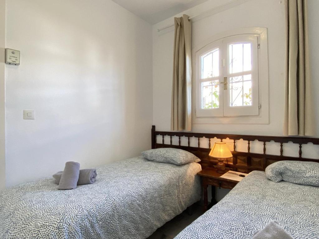Posteľ alebo postele v izbe v ubytovaní Verano Azul 32 Casasol Apartments