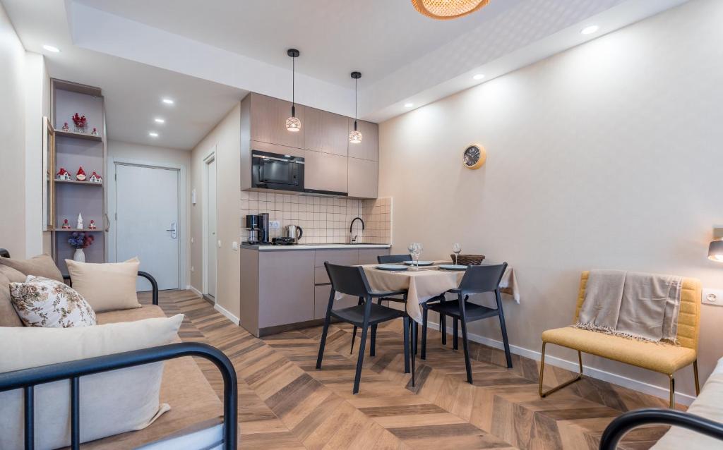 Kuchyň nebo kuchyňský kout v ubytování New Gudauri Neo Apartment 306