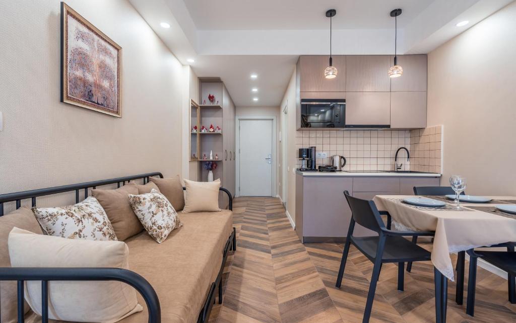 Kuchyň nebo kuchyňský kout v ubytování New Gudauri Neo Apartment 306