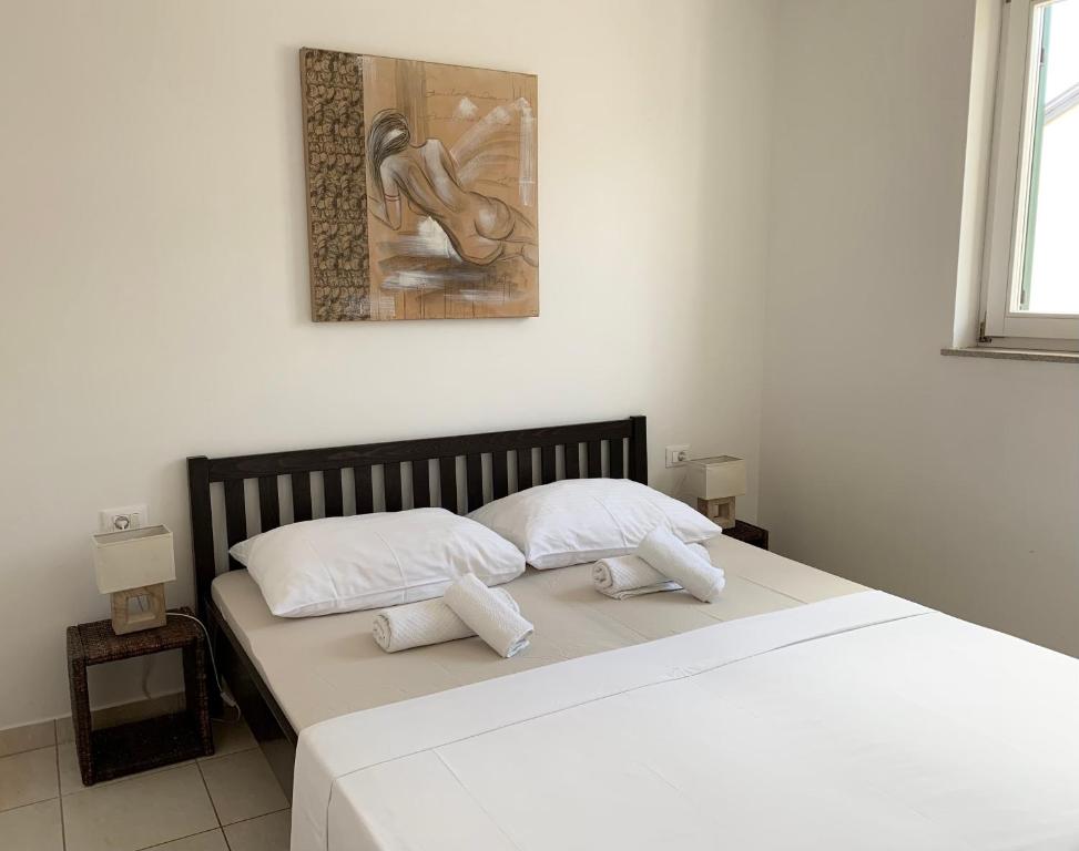 Łóżko lub łóżka w pokoju w obiekcie Apartments Happy Stay Center Baska