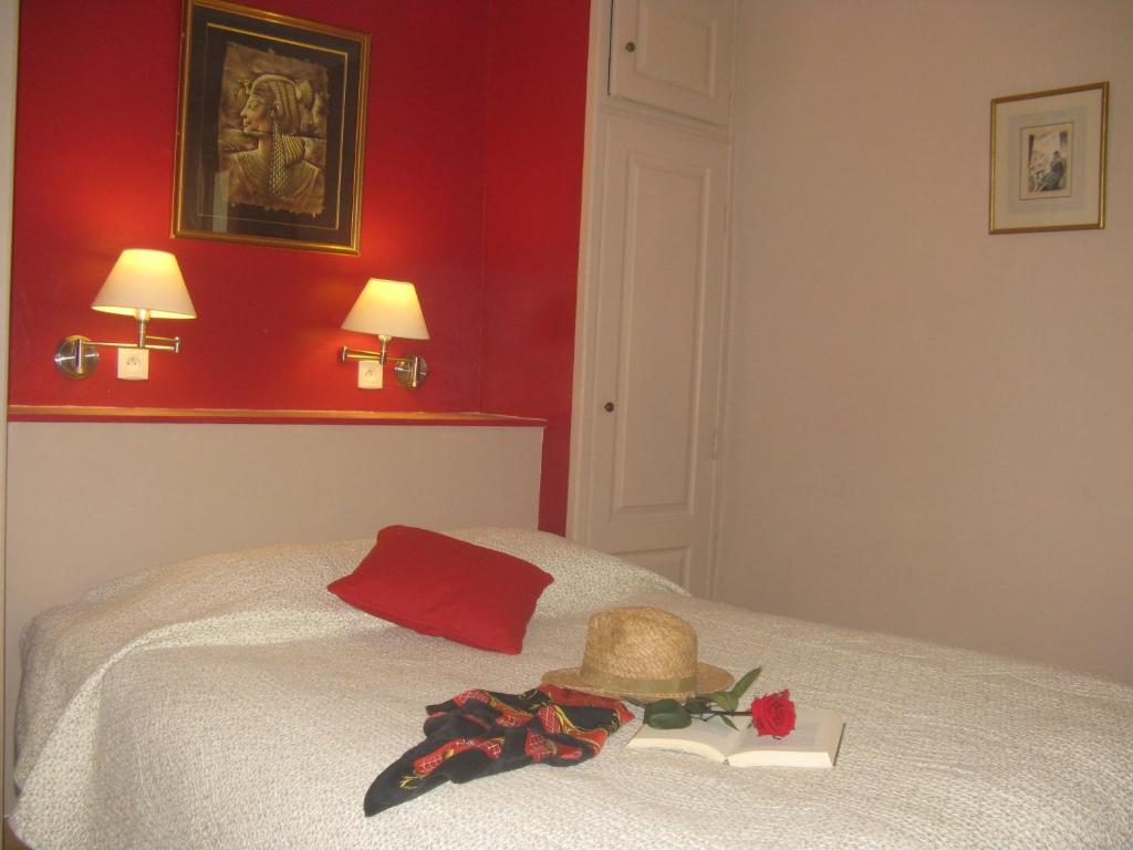 Postel nebo postele na pokoji v ubytování Hotellerie de l'Esplanade