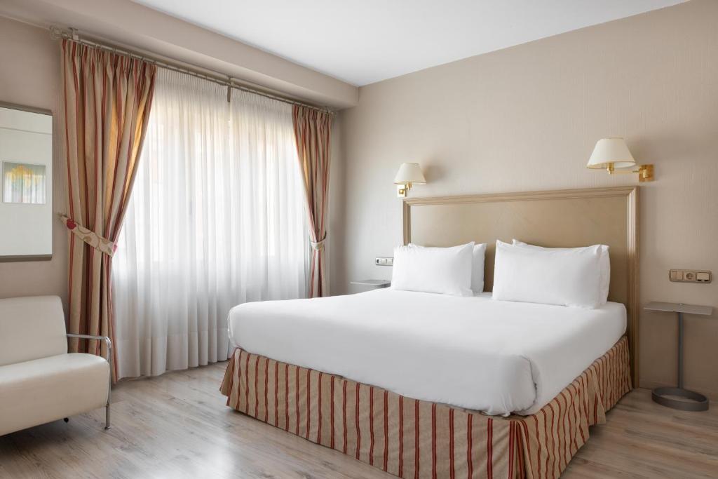 Postel nebo postele na pokoji v ubytování Crisol Almirante Bonifaz