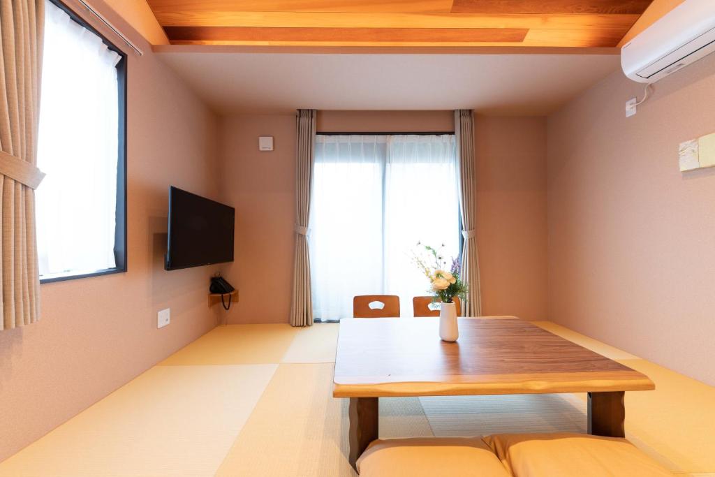 TV a/nebo společenská místnost v ubytování スタジオーネ 箱根強羅 West - Stagione Hakone Gora West