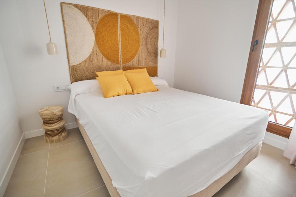 Postel nebo postele na pokoji v ubytování Slow Home Apartments