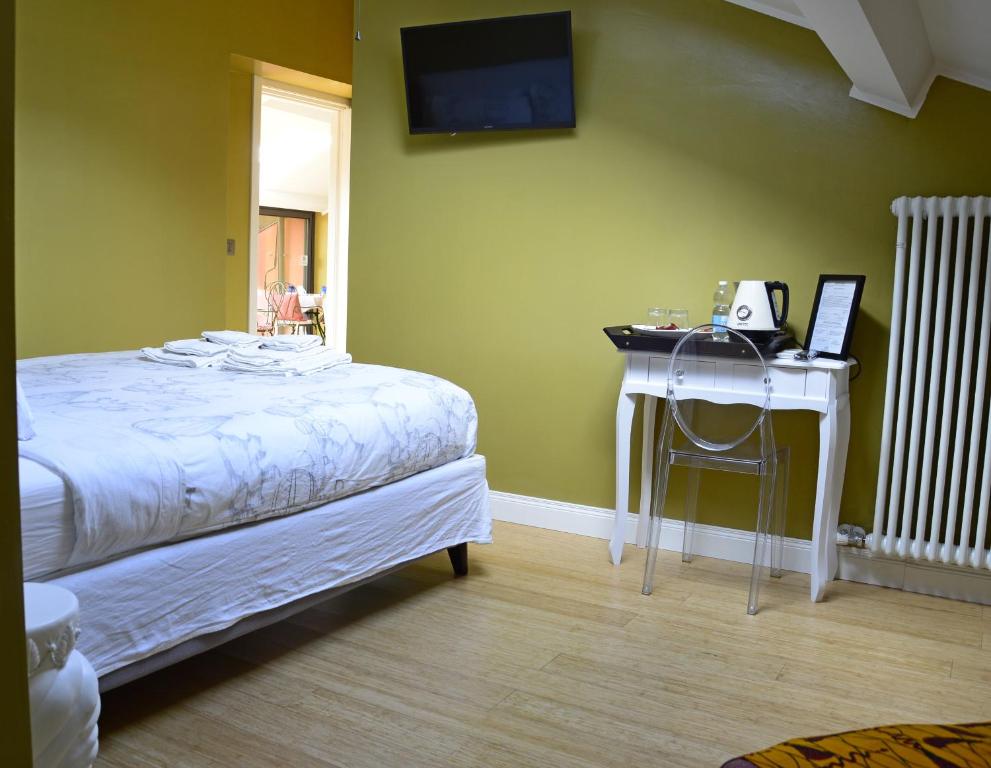 Postel nebo postele na pokoji v ubytování B&B Via Roma 41