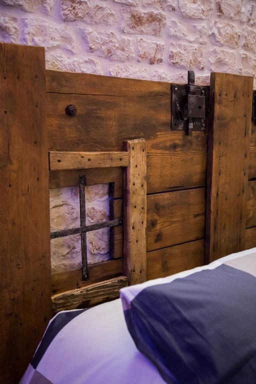 Łóżko lub łóżka w pokoju w obiekcie SINFONIE PUGLIESI LUXURY ROOM