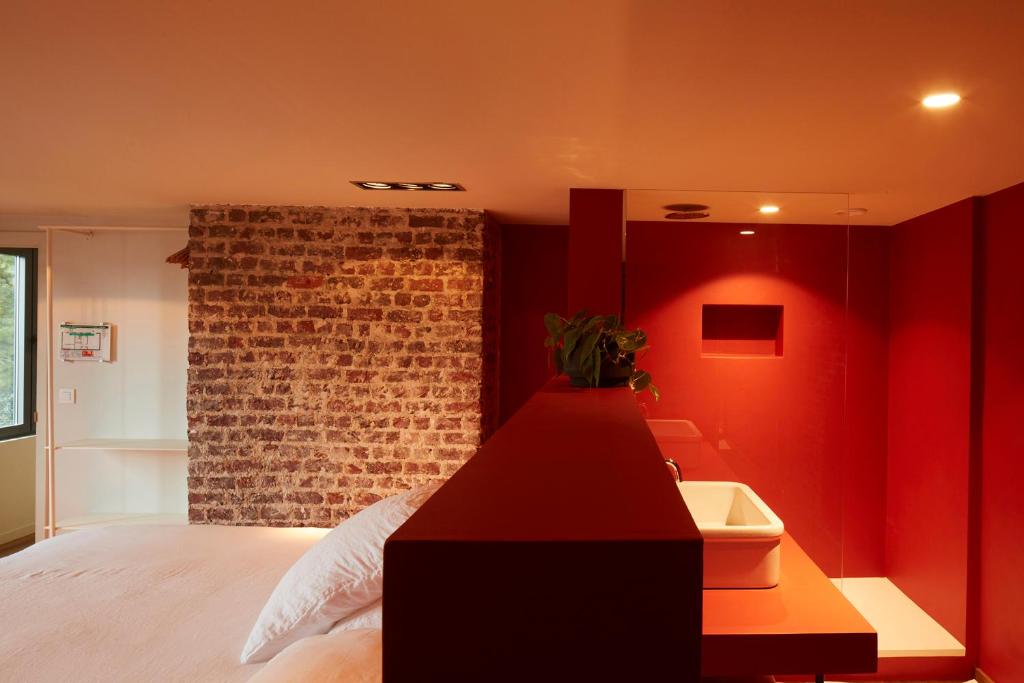 Postel nebo postele na pokoji v ubytování Chambre d'Amis by Alix