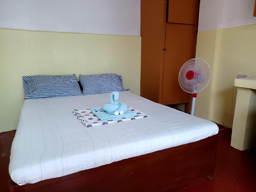 Postel nebo postele na pokoji v ubytování Pete's inn