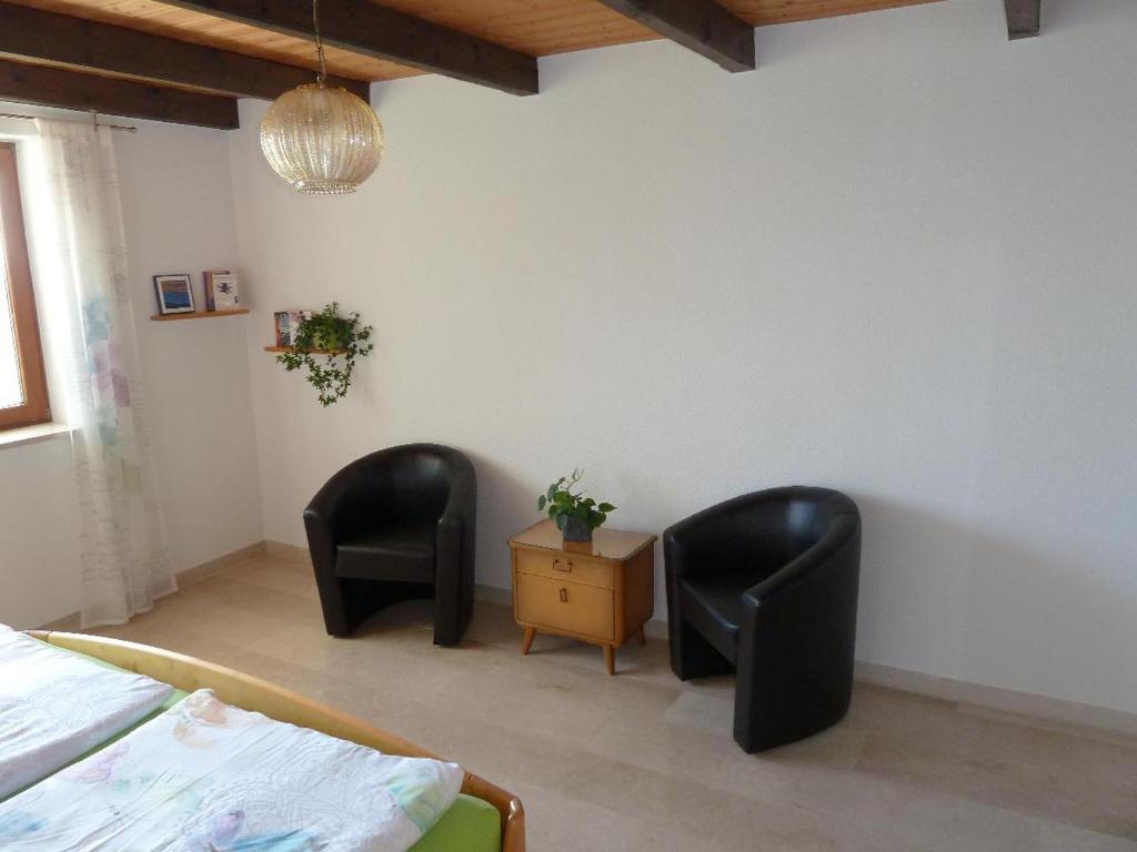 Posezení v ubytování Ferienwohnung Urlaub mit Aussicht