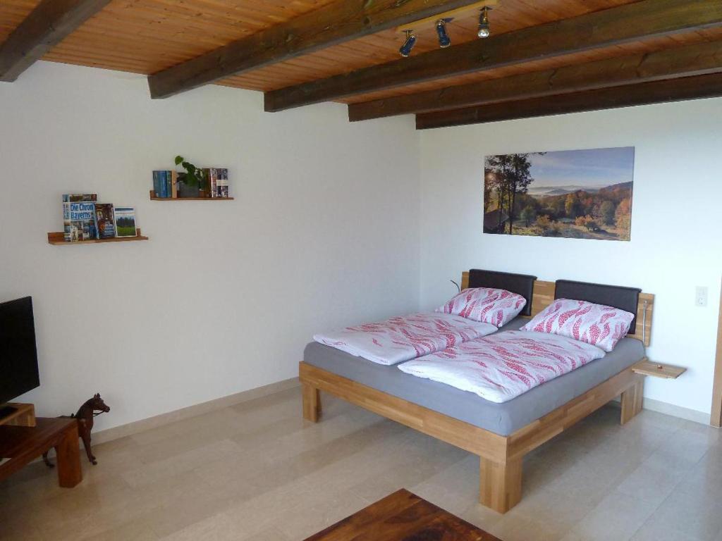 Postel nebo postele na pokoji v ubytování Ferienwohnung Urlaub mit Aussicht