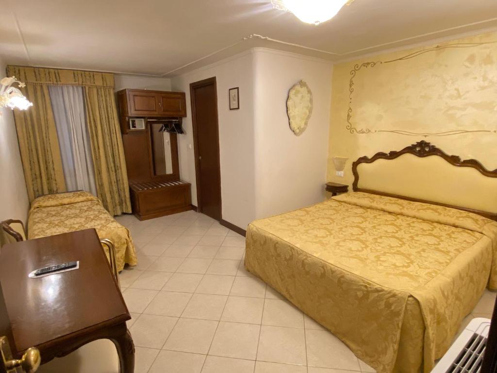 Postel nebo postele na pokoji v ubytování Hotel Scandinavia - Relais