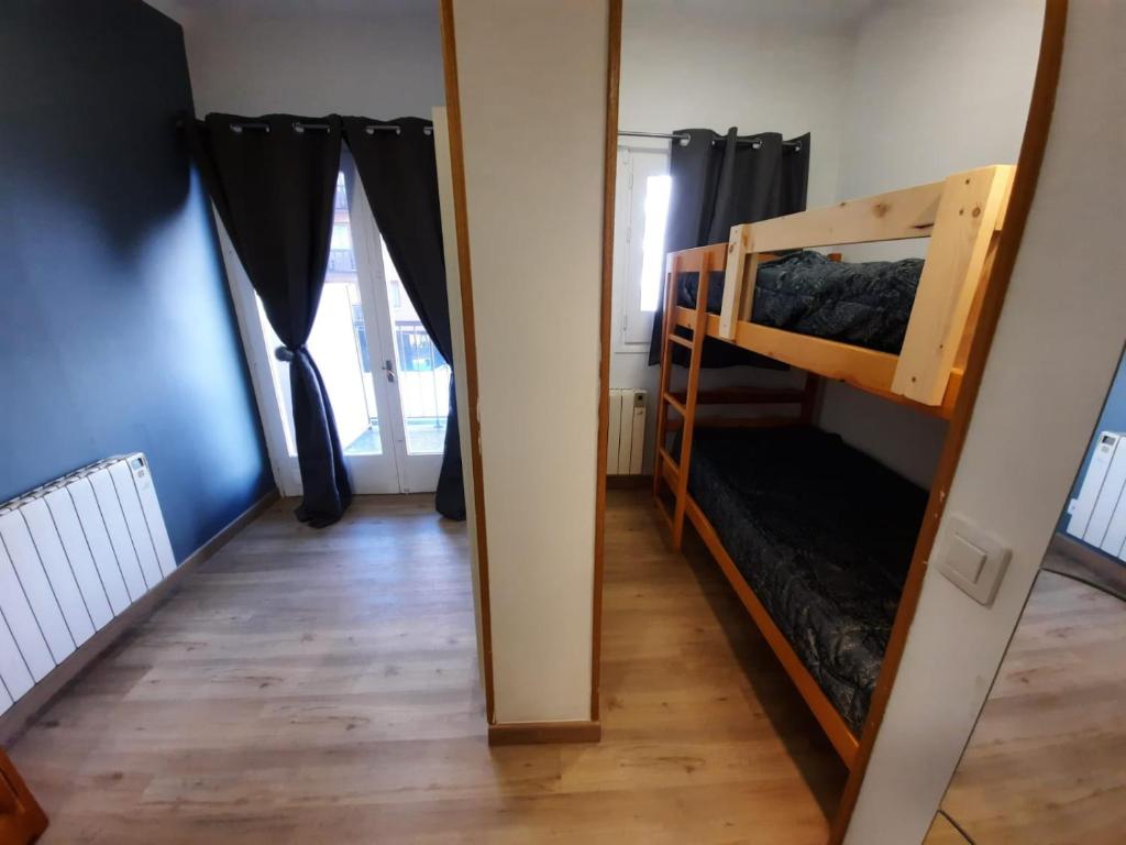Postel nebo postele na pokoji v ubytování Altissim Tres Estrelles