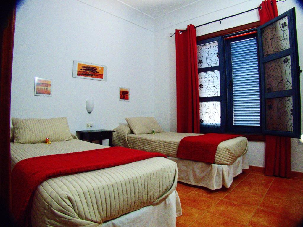 Postel nebo postele na pokoji v ubytování Villa Raima
