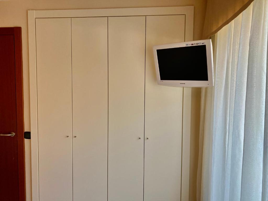 TV a/nebo společenská místnost v ubytování PROBER_SISCARO