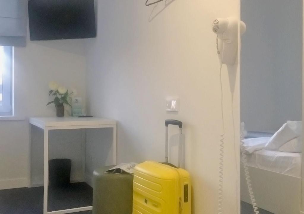Postel nebo postele na pokoji v ubytování Kyivpasservis Hotel
