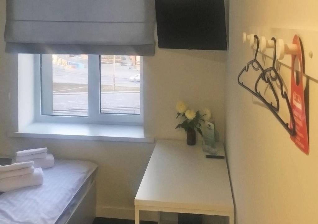Postel nebo postele na pokoji v ubytování Kyivpasservis Hotel