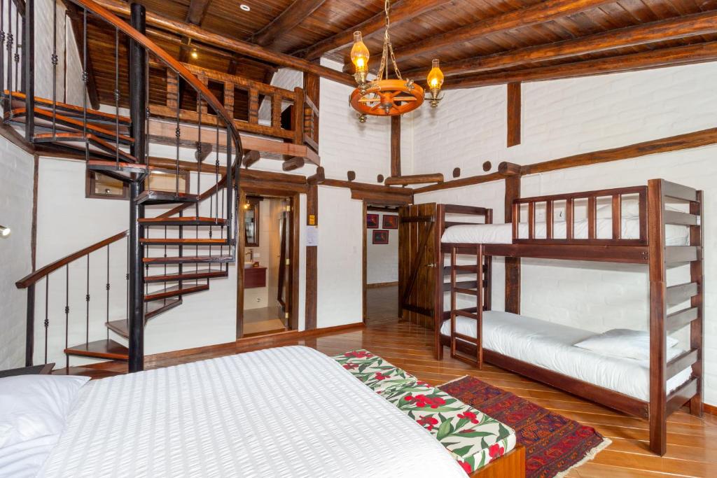 Postel nebo postele na pokoji v ubytování Hotel ILÉ