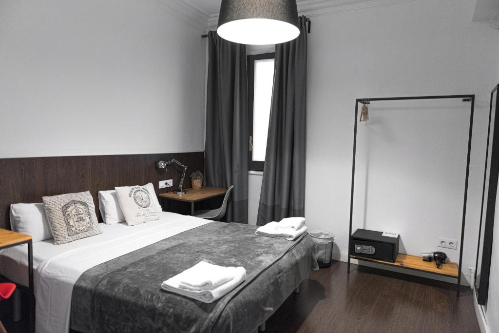 Postel nebo postele na pokoji v ubytování Traveller House