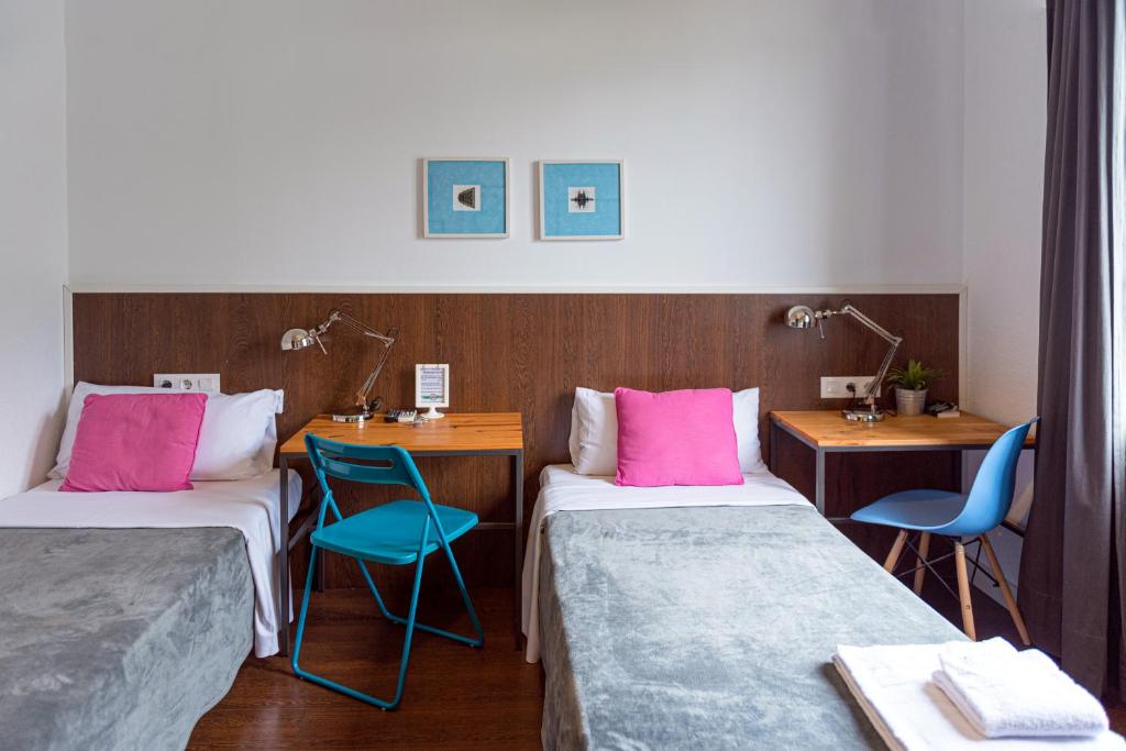 Postel nebo postele na pokoji v ubytování Traveller House