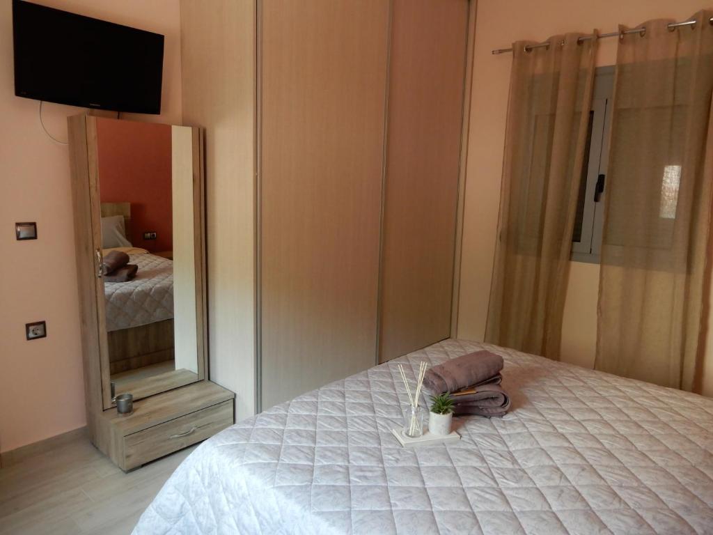 Postel nebo postele na pokoji v ubytování Royal Legend Suite