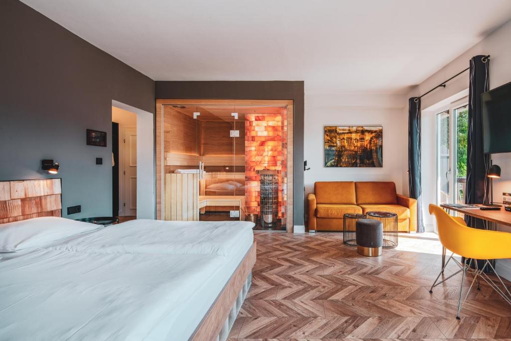 Postel nebo postele na pokoji v ubytování Villa Sonnenhof Boutique-Hotel