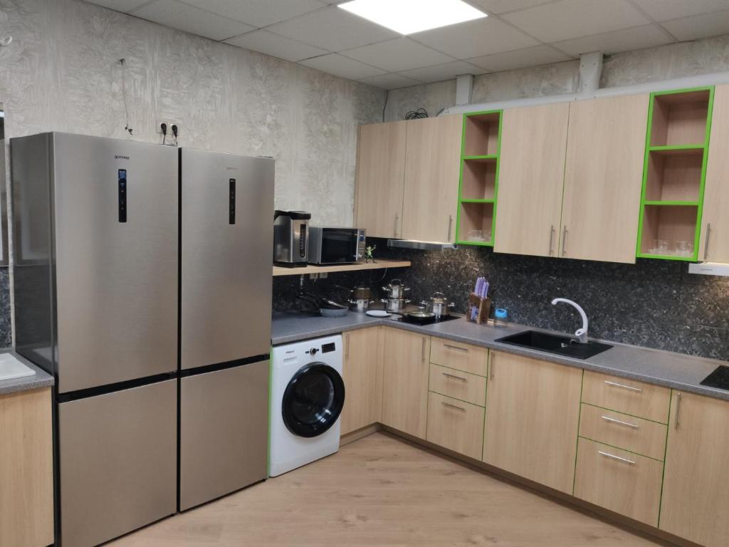 Kuchyň nebo kuchyňský kout v ubytování STAR CITY Hostel