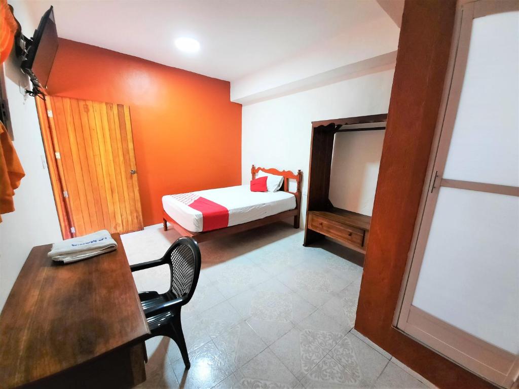 Postel nebo postele na pokoji v ubytování Hotel Costa Maria