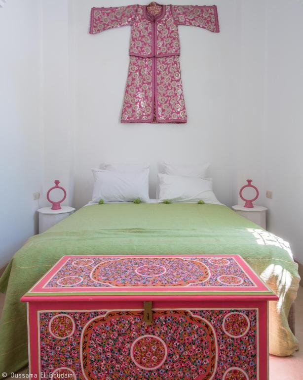 Ein Bett oder Betten in einem Zimmer der Unterkunft Riad Dar Rabiaa