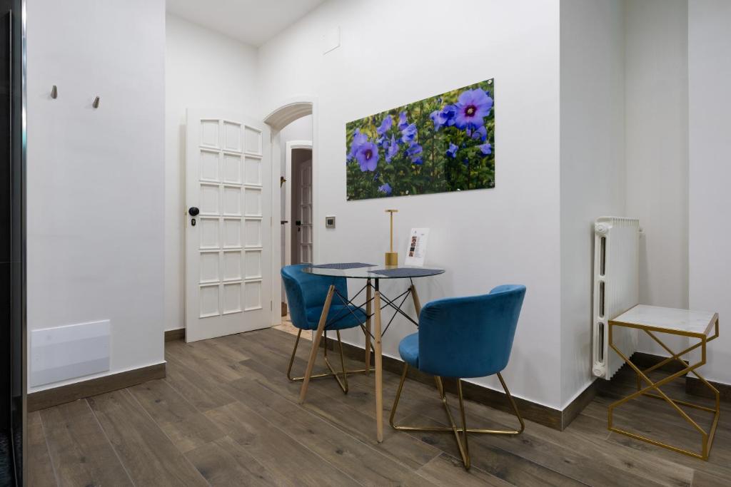 TV a/nebo společenská místnost v ubytování Hotel Ibisco Suites & Relax