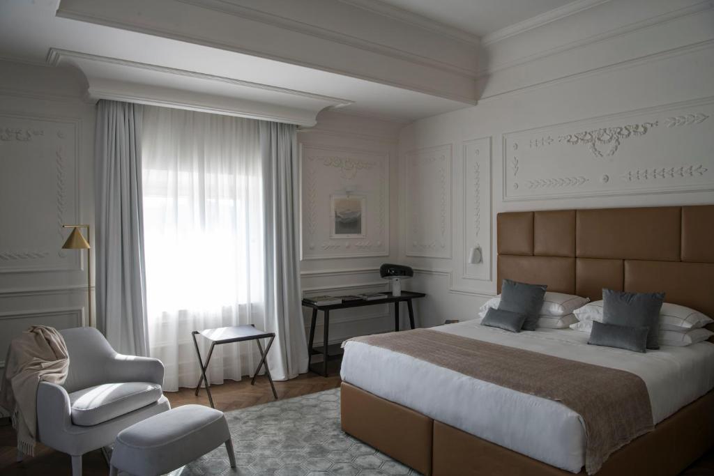 Postel nebo postele na pokoji v ubytování Dimora Palanca Boutique & SPA