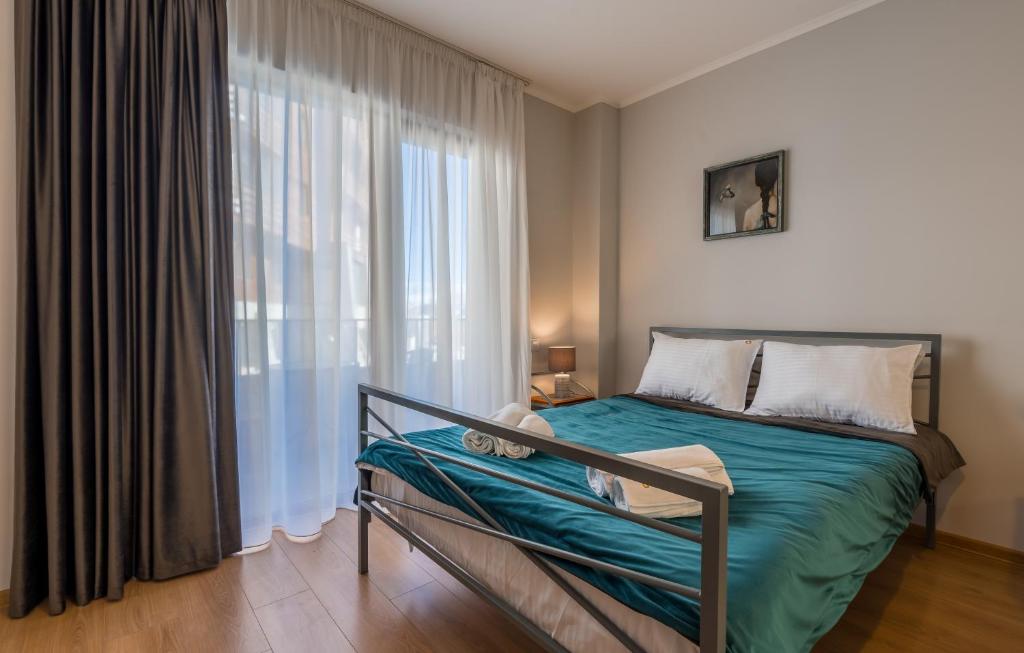 Ένα ή περισσότερα κρεβάτια σε δωμάτιο στο Gudauri 18-GN